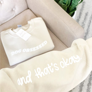 "dog obsessed and that's okay." crewneck